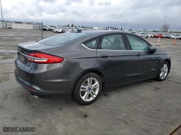 2018 Ford Fusion Hybrid SE with VIN 3FA6P0LU0JR140030, listed as a Copart auction lot 51165995 with 165,602 mi miles and Clean Title. Bid and sale history available at carsss.com. Image 3.