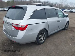 2013 Honda Odyssey EX-L with VIN 5FNRL5H65DB050789, listed as a IAAI auction lot 41911537 with 160,348 mi miles and . Bid and sale history available at carsss.com. Image 4.