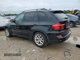 2012 BMW X5 35i with VIN 5UXZV4C50CL989832, listed as a Copart auction lot 62606485 with 157,025 mi miles and Clean title. Bid and sale history available at DreamBid. Image 2.