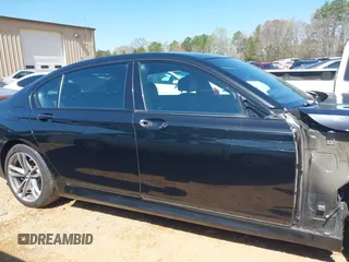 2019 BMW 7 Series 740i xDrive with VIN WBA7E4C57KGV70521, listed as a IAAI auction lot 41881538 with 114,480 mi miles and . Bid and sale history available at DreamBid. Image 14.