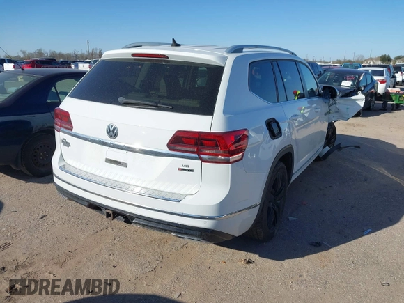 2018 Volkswagen Atlas SEL with VIN 1V2RR2CA1JC566065, listed as a IAAI auction lot 41687434 with 77,795 mi miles and . Bid and sale history available at DreamBid. Image 4.