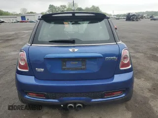 2013 MINI Hardtop S with VIN WMWSV3C55DT387777, listed as a Copart auction lot 56495215 with 53,033 mi miles and Salvage title. Bid and sale history available at DreamBid. Image 6.