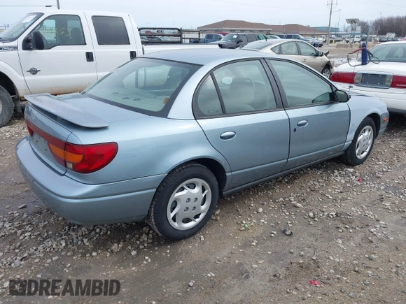 2002 Saturn SL z VIN 1G8ZK52702Z105381, wystawiony jako IAAI lot #41962378 z przebiegiem 169 204 mil mil oraz . Historia ofert i sprzedaży dostępna na DreamBid. Obrazek 4.