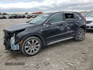 2019 Cadillac XT4 FWD Premium Luxury z VIN 1GYFZCR49KF147242, wystawiony jako Copart lot #55483215 z przebiegiem 94 990 mil mil oraz Szkody całkowita. Historia ofert i sprzedaży dostępna na DreamBid. Obrazek 1.