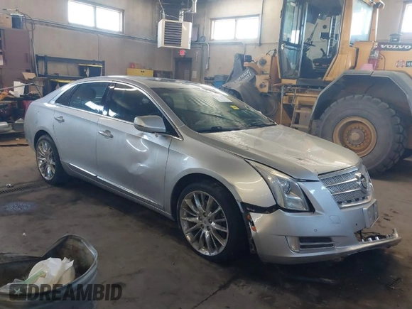 2013 Cadillac XTS Platinum with VIN 2G61V5S31D9190738, listed as a IAAI auction lot 41657461 with 136,924 mi miles and . Bid and sale history available at carsss.com. Image 1.