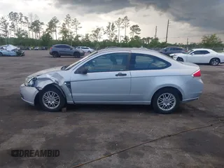 2008 Ford Focus SE with VIN 1FAHP33N58W121614, listed as a IAAI auction lot 42535574 with 156,624 mi miles and . Bid and sale history available at DreamBid. Image 14.