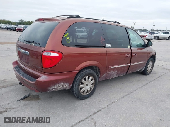 2007 Chrysler Town & Country LWB Touring with VIN 2A4GP54L97R294178, listed as a IAAI auction lot 41326629 with 251,055 mi miles. Bid and sale history available at carsss.com. Image 4.