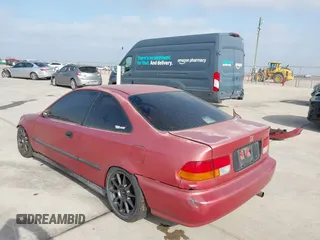 1996 Honda Civic DX with VIN 1HGEJ6125TL056431, listed as a IAAI auction lot 41770145 with 210,240 mi miles. Bid and sale history available at carsss.com. Image 3.