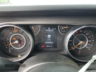 2023 Jeep Wrangler Sport S z VIN 1C4HJXDNXPW617637, wystawiony jako Copart lot #58724555 z przebiegiem 15 811 mil mil oraz Szkoda całkowita • Salvage title. Historia ofert i sprzedaży dostępna na DreamBid. Obrazek 9.