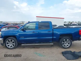 2018 Chevrolet Silverado 1500 LT with VIN 3GCPCREH1JG125997, listed as a IAAI auction lot 41884888 with 122,406 mi miles and . Bid and sale history available at DreamBid. Image 14.