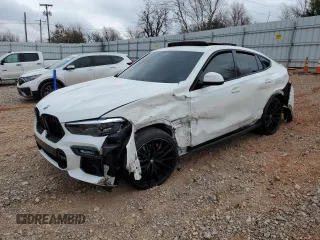2021 BMW X6 sDrive40i z VIN 5UXCY4C03M9H36510, wystawiony jako Copart lot #86419524 z przebiegiem Nie podano mil oraz Szkody całkowita. Historia ofert i sprzedaży dostępna na DreamBid. Obrazek 1.