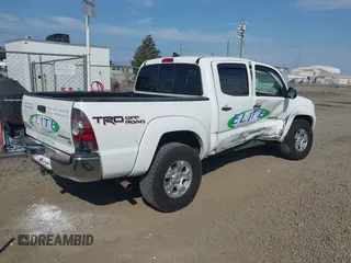 2014 Toyota Tacoma PreRunner with VIN 3TMJU4GN7EM158230, listed as a IAAI auction lot 40010521 with 145,185 mi miles. Bid and sale history available at carsss.com. Image 4.