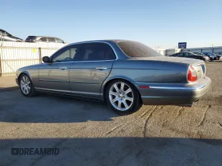 2004 Jaguar XJ with VIN SAJWA71C74SG20299, listed as a Copart auction lot 79469504 with 78,134 mi miles and Salvage Title. Bid and sale history available at carsss.com. Image 2.