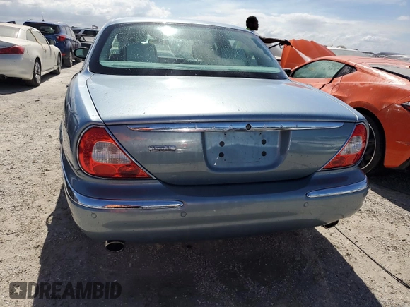 2006 Jaguar XJ Vanden Plas with VIN SAJWA82B66SG50019, listed as a Copart auction lot 76405544 with 0 mi miles and Non Repairable. Bid and sale history available at carsss.com. Image 6.