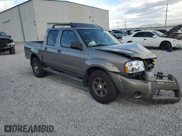 2003 Nissan Frontier XE with VIN 1N6ED27T73C433384, listed as a Copart auction lot 80153654 with 248,803 mi miles and Salvage title. Bid and sale history available at DreamBid. Image 4.