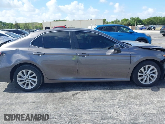 2023 Toyota Camry LE z VIN 4T1C11AK2PU080805, wystawiony jako IAAI lot #42165528 z przebiegiem 28 307 mil mil oraz . Historia ofert i sprzedaży dostępna na DreamBid. Obrazek 13.