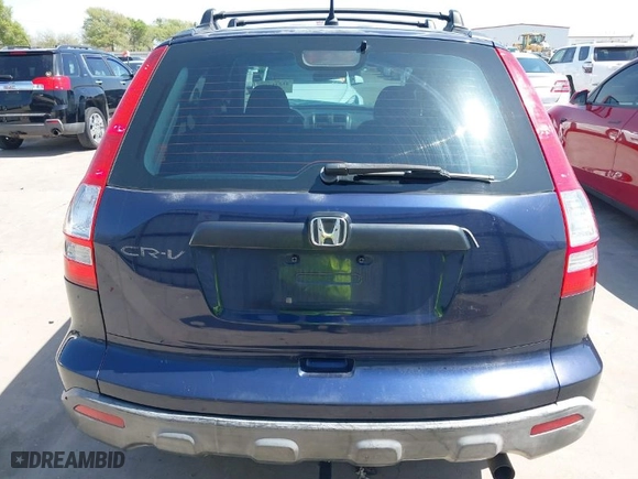2007 Honda CR-V LX with VIN JHLRE38367C011752, listed as a IAAI auction lot 41831440 with 142,680 mi miles. Bid and sale history available at carsss.com. Image 17.
