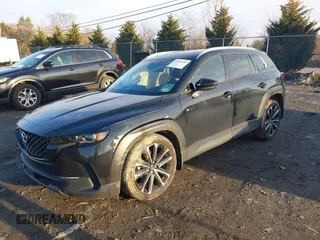 2024 Mazda CX-50 S Premium Plus z VIN 7MMVABEM5RN209065, wystawiony jako IAAI lot #41525183 z przebiegiem 12 297 mil mil oraz . Historia ofert i sprzedaży dostępna na DreamBid. Obrazek 2.