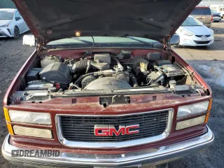 1999 GMC Yukon with VIN 1GKEK13R2XJ728279, listed as a Copart auction lot 84099064 with 162,131 mi miles and Clean Title. Bid and sale history available at carsss.com. Image 12.