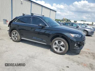 2023 Audi Q5 Premium Plus with VIN WA1BBAFY1P2004265, listed as a Copart auction lot 56479045 with 25,386 mi miles and Salvage title. Bid and sale history available at DreamBid. Image 4.
