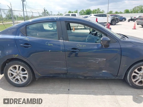 2018 Toyota Yaris with VIN 3MYDLBYV7JY305900, listed as a IAAI auction lot 42052167 with 128,876 mi miles and . Bid and sale history available at DreamBid. Image 6.
