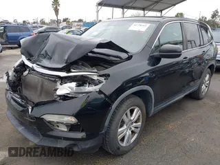 2016 Honda Pilot LX with VIN 5FNYF6H18GB063909, listed as a IAAI auction lot 41778361 with 110,655 mi miles. Bid and sale history available at carsss.com. Image 2.