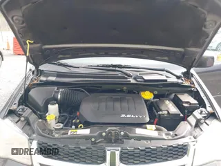 2014 Dodge Grand Caravan SXT with VIN 2C4RDGCG6ER376714, listed as a IAAI auction lot 41828025 with 172,285 mi miles and . Bid and sale history available at DreamBid. Image 10.