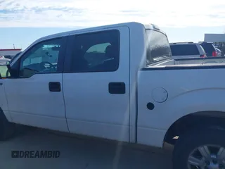 2012 Ford F-150 XL with VIN 1FTFW1CF9CFA94640, listed as a IAAI auction lot 41703729 with 216,291 mi miles. Bid and sale history available at carsss.com. Image 14.