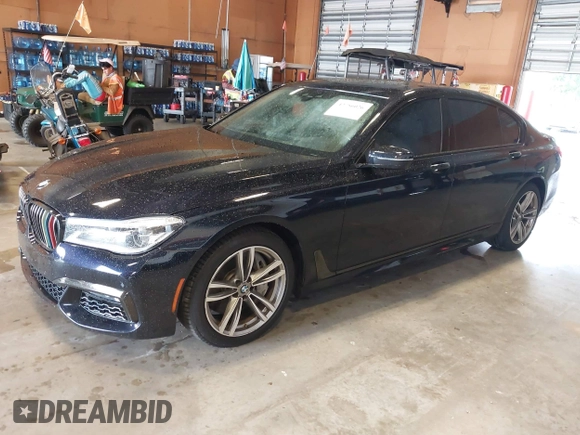 2019 BMW 7 Series 750i xDrive with VIN WBA7F2C51KB239044, listed as a IAAI auction lot 42756026 with 65,028 mi miles and . Bid and sale history available at DreamBid. Image 18.