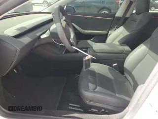 2025 Tesla Model 3 Long Range with VIN 5YJ3E1EB9SF902505, listed as a Copart auction lot 49849535 with 1,977 mi miles and Salvage Title. Bid and sale history available at DreamBid. Image 7.