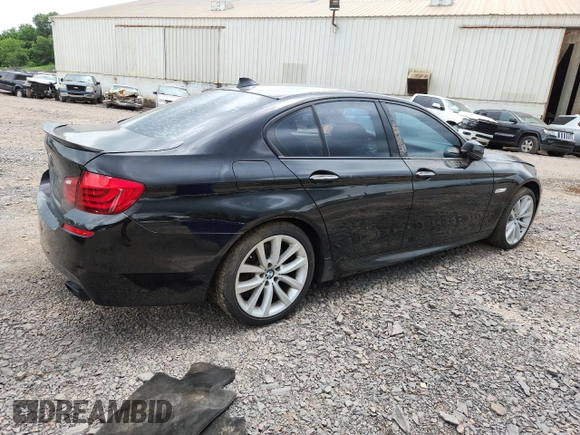 2013 BMW 5 Series 550i xDrive with VIN WBAFU9C55DDY72065, listed as a Copart auction lot 63023675 with 117,592 mi miles and Salvage title. Bid and sale history available at DreamBid. Image 3.