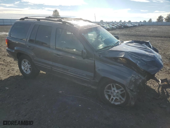 2003 Jeep Grand Cherokee Limited with VIN 1J8GW58N73C502929, listed as a Copart auction lot 79472734 with 231,176 mi miles and Salvage Title. Bid and sale history available at carsss.com. Image 4.