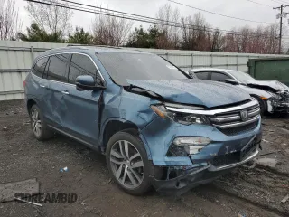 2016 Honda Pilot Touring with VIN 5FNYF6H91GB022219, listed as a Copart auction lot 52796985 with 142,014 mi miles and Salvage Title. Bid and sale history available at carsss.com. Image 4.