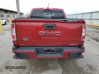 2021 GMC Canyon 4WD AT4 w/Cloth with VIN 1GTG6FENXM1185842, listed as a Copart auction lot 52574755 with 47,322 mi miles and Salvage Title. Bid and sale history available at carsss.com. Image 6.