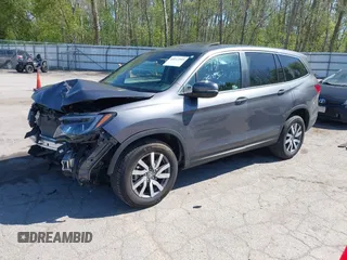 2020 Honda Pilot EX-L z VIN 5FNYF6H58LB049652, wystawiony jako IAAI lot #42213555 z przebiegiem 84 846 mil mil oraz . Historia ofert i sprzedaży dostępna na DreamBid. Obrazek 2.