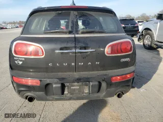 2016 MINI Cooper Clubman S with VIN WMWLN9C57G2B31788, listed as a Copart auction lot 82565434 with 121,977 mi miles and Salvage Title. Bid and sale history available at carsss.com. Image 6.