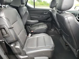 2018 Chevrolet Traverse Premier z VIN 1GNEVJKW7JJ150494, wystawiony jako Copart lot #58755745 z przebiegiem 193 346 mil mil oraz Czysty tytuł • Clean title. Historia ofert i sprzedaży dostępna na DreamBid. Obrazek 11.