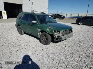 2003 Subaru Forester XS with VIN JF1SG65673H706138, listed as a Copart auction lot 77705784 with 260,423 mi miles and Salvage Title. Bid and sale history available at carsss.com. Image 12.