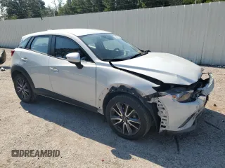 2018 Mazda CX-3 Touring with VIN JM1DKDC75J0329502, listed as a Copart auction lot 68061054 with 92,238 mi miles and Salvage Title. Bid and sale history available at carsss.com. Image 4.