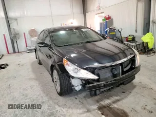 2012 Hyundai Sonata Limited z VIN 5NPEC4AB6CH398228, wystawiony jako Copart lot #81450264 z przebiegiem 126 016 mil mil oraz Szkoda całkowita • Salvage title. Historia ofert i sprzedaży dostępna na DreamBid. Obrazek 11.