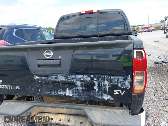 2019 Nissan Frontier SV z VIN 1N6AD0ER7KN788231, wystawiony jako IAAI lot #42215640 z przebiegiem 75 856 mil mil oraz . Historia ofert i sprzedaży dostępna na DreamBid. Obrazek 16.