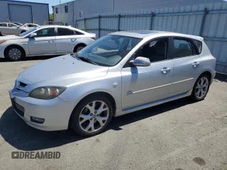 2007 Mazda 3 S Touring z VIN JM1BK344171774148, wystawiony jako Copart lot #58203265 z przebiegiem 191 298 mil mil oraz Czysty tytuł • Clean title. Historia ofert i sprzedaży dostępna na DreamBid. Obrazek 1.