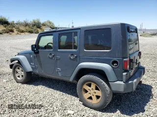 2008 Jeep Wrangler Unlimited X with VIN 1J4GA39168L509720, listed as a Copart auction lot 61014895 with 238,932 mi miles and Salvage title. Bid and sale history available at DreamBid. Image 2.