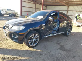 2014 BMW X6 xDrive35i with VIN 5UXFG2C59E0H11200, listed as a IAAI auction lot 41151158 with 140,478 mi miles. Bid and sale history available at carsss.com. Image 2.