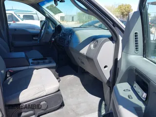 2005 Ford F-150 XLT with VIN 1FTPW125X5KE67448, listed as a IAAI auction lot 41975500 with 298,230 mi miles. Bid and sale history available at carsss.com. Image 5.