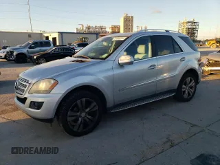 2009 Mercedes-Benz M 3.5L with VIN 4JGBB56EX9A521264, listed as a Copart auction lot 87000234 with 239,700 mi miles and Clean Title. Bid and sale history available at carsss.com. Image 1.