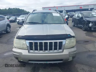 2004 Jeep Grand Cherokee Limited with VIN 1J4GX58SX4C255363, listed as a IAAI auction lot 42619798 with 239,475 mi miles and . Bid and sale history available at DreamBid. Image 12.