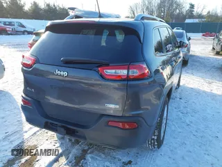 2018 Jeep Cherokee Latitude Plus with VIN 1C4PJMLX9JD501751, listed as a IAAI auction lot 41608437 with 117,928 mi miles and . Bid and sale history available at DreamBid. Image 4.