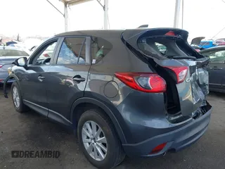 2014 Mazda CX-5 Touring with VIN JM3KE2CY9E0384401, listed as a IAAI auction lot 41699913 with 75,301 mi miles. Bid and sale history available at carsss.com. Image 3.