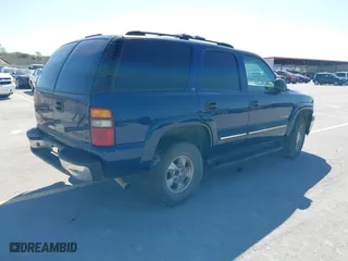 2001 Chevrolet Tahoe LT with VIN 1GNEC13T71J184865, listed as a IAAI auction lot 41799799 with 290,196 mi miles. Bid and sale history available at carsss.com. Image 4.